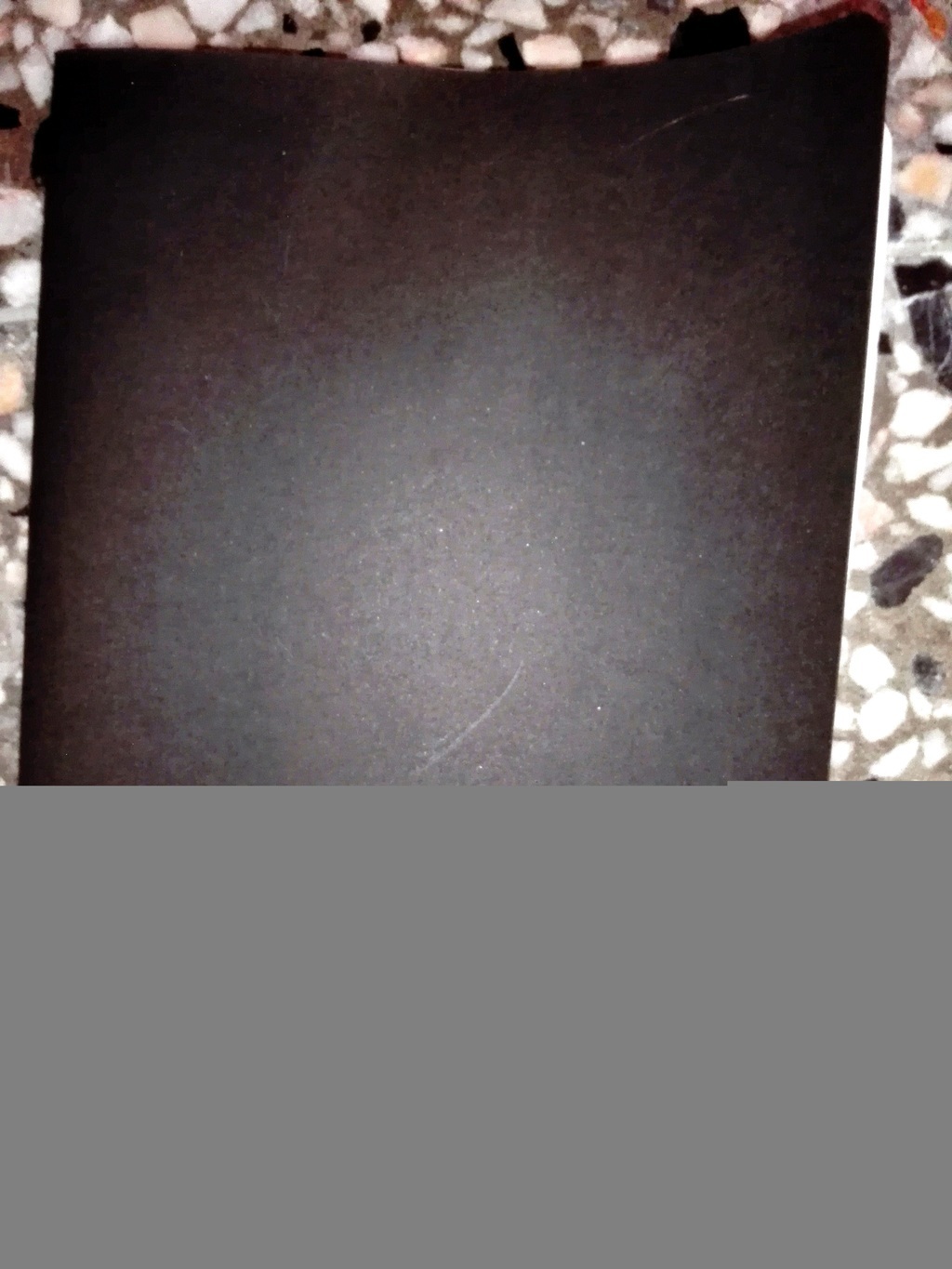 material de escol(caderno preto)